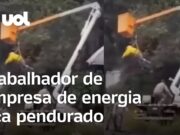 Caminhão de empresa de energia tomba em barranco e trabalhador fica pendurado no RJ
