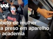 Mulher com rabo de cavalo fica com cabelo preso em aparelho de academia; veja