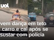 Jovem dança em teto de carro em movimento e cai após se assustar com polícia; veja