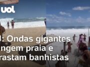 Vídeos mostram momento em que ondas gigantes invadem praia e arrastam banhistas