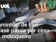 Motoqueiro cai da moto e é quase atropelado por caminhão de lixo; veja