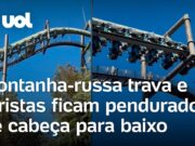Montanha-russa trava e turistas ficam pendurados de cabeça para baixo no Japão