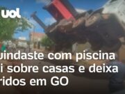 Guindaste com piscina cai em cima casas e deixa feridos; vídeo mostra momento da queda