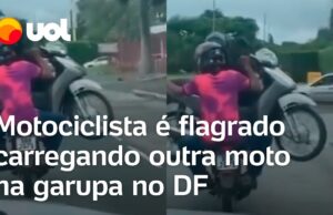 Motociclista é flagrado carregando outra moto e passageiro na garupa; veja