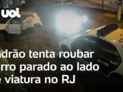 Vídeo flagra ladrão tentando roubar carro estacionado ao lado de viatura da polícia no RJ