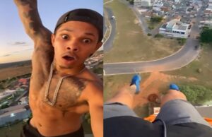 Homem sobe em torre e fica pendurado com uma mão só no DF; veja