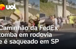 Caminhão da FedEx tomba, e pessoas saqueiam mercadorias antes de socorro chegar