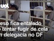 Preso fica entalado ao tentar fugir de cela em delegacia no DF; veja