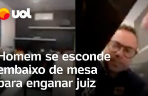 Advogado e cliente tentam enganar juiz e homem se esconde embaixo de mesa