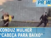 Mulher é levada de cabeça para baixo para viatura policial no RJ; veja