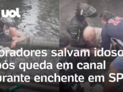 Veja Video – Moradores salvam idoso após queda em canal durante enchente em Santos; veja