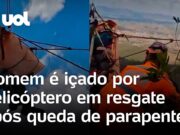 Homem é içado por helicóptero em resgate após queda de parapente; veja vídeo